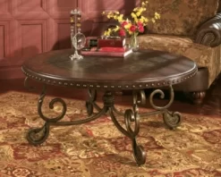 Signature Design By Ashley® Rafferty Dark Brown Round Coffee  Table -Furniture comprehensive store 4ca5ff1b 9187 47cf 8433 ff09b30467e9