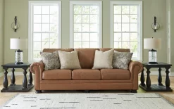 Signature Design By Ashley® Carianna Caramel Sofa -Furniture comprehensive store 929cd239 828d 4d8d a938 f51c18cfc6a1 scaled