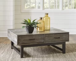 Signature Design By Ashley® Mondoro Grayish Brown Lift Top Coffee Table -Furniture comprehensive store a98bfe21 b0ca 4fe3 90c7 8ae32fbed29a