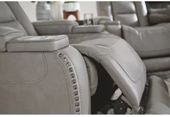Signature Design By Ashley® The Man-Den Gray Leather Power Reclining Loveseat With Adjustable Headrest -Furniture comprehensive store b3055b07 0ed6 497e b00a b5a7b471dc83
