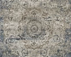 Signature Design By Ashley® South Blue/Tan 5' X 7' Medium Area Rug -Furniture comprehensive store c73a9cdb c1ea 40f4 96fb 8bf8bb1e8e34